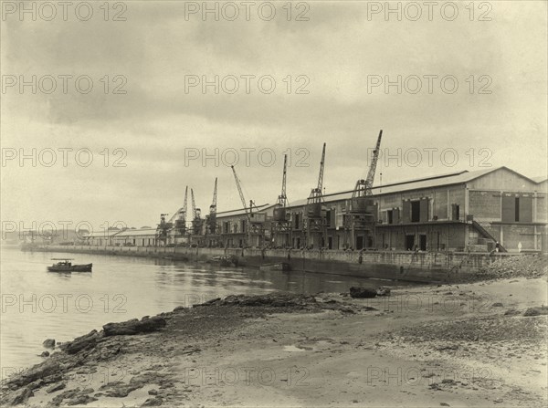 Dockside cranes at Kilindini harbour. Cranes on the dockside at Kilindini harbour. Mombasa, Kenya, circa 1930. Mombasa, Coast, Kenya, Eastern Africa, Africa.