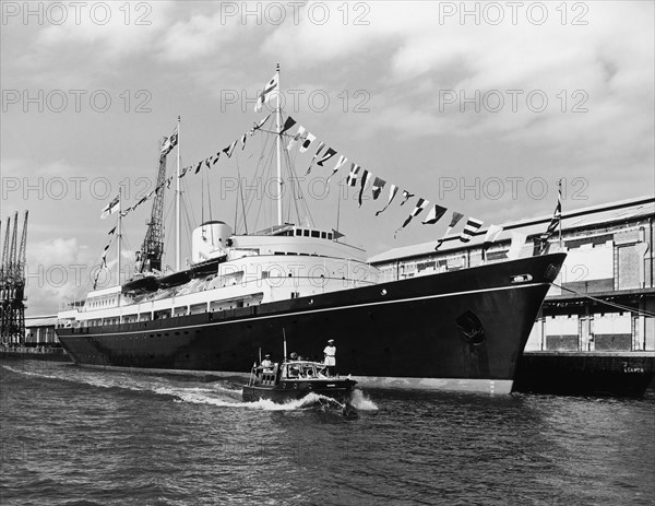 Royal yacht HMS Britannia at Kilindini harbour. A publicity photograph from the East African Railways and Harbours Administration (EAR&H) showing the British royal yacht moored at Kilindini harbour. Mombasa, Kenya, 22 September 1956. Mombasa, Coast, Kenya, Eastern Africa, Africa.