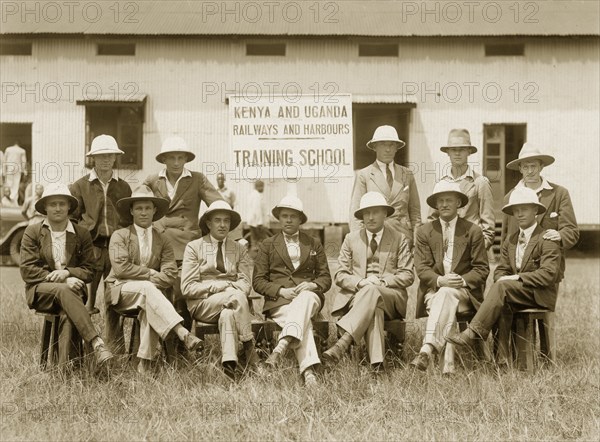 Railway training staff. Group portrait of the teaching staff at the training school of the Kenya and Uganda Railways and Harbours Authority, later the East African Railways and Harbours Administration (EAR&H). Kenya, circa 1936. Kenya, Eastern Africa, Africa.