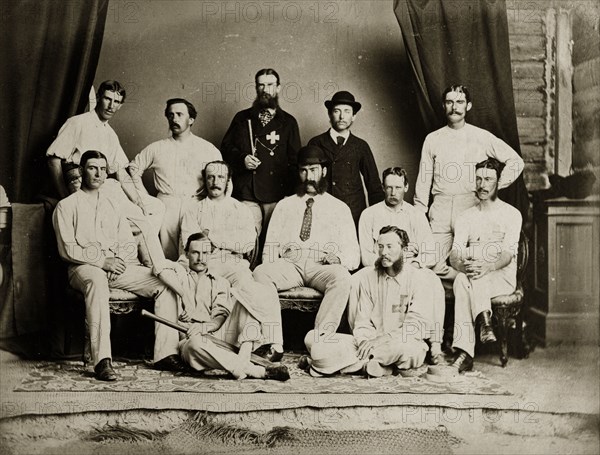 Members of the south Bombay cricket team. Members of the south Bombay cricket team pose for a studio camera dressed in their sporting whites. Bombay (Mumbai), India, circa 1875. Mumbai, Maharashtra, India, Southern Asia, Asia.
