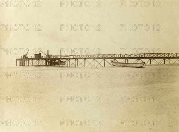Calicut pier, India. The historic pier at Calicut stretches out into the Arabian Sea on the Kerala coast. Calicut, India, circa 1910. Calicut, Kerala, India, Southern Asia, Asia.
