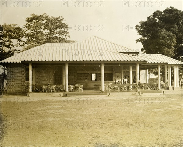 Rangoon Golf Club. Front view of the newly opened club house at the Rangoon Golf Club. A bar for club members opens out onto the veranda. Rangoon (Yangon), Burma (Myanmar), circa 1952. Yangon, Yangon, Burma (Myanmar), South East Asia, Asia.