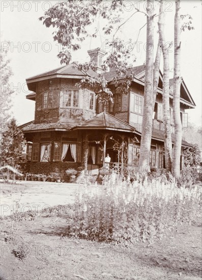 European-style house in Maymyo. A two-storey, European-style brick house in Maymyo (Pyin U Lwin). Maymyo, Burma (Pyin U Lwin, Myanmar), circa 1905. Pyin U Lwin, Mandalay, Burma (Myanmar), South East Asia, Asia.
