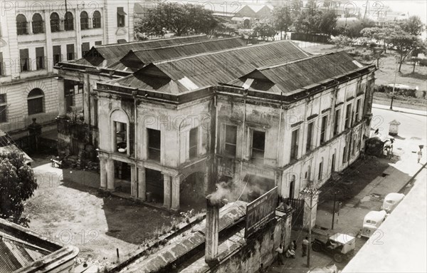 A colonial building in Rangoon. Exterior view of a large, two-storey building belonging to Sydney Webster & Co., a European company based in Rangoon. Rangoon (Yangon), Burma (Myanmar), circa 1940. Yangon, Yangon, Burma (Myanmar), South East Asia, Asia.