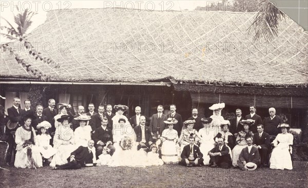 A European wedding party in Burma. Formally dressed men, women and children gather for a group photograph during a European wedding party. Probably Burma (Myanmar), circa 1905. Burma (Myanmar), South East Asia, Asia.