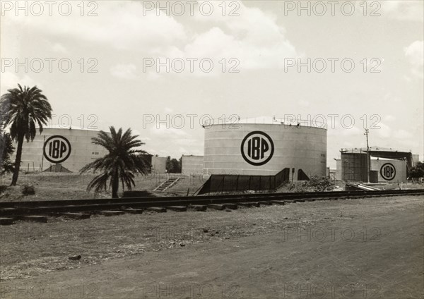 Indo-Burma Petroleum Company plant. Exterior shot of several large petrol storage tanks at the Indo-Burma Petroleum Company plant. Burma (Myanmar), circa 1942. Burma (Myanmar), South East Asia, Asia.