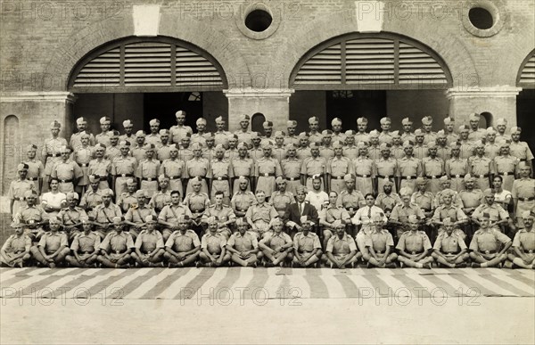 A cadre of the Indian Armed Police. Outdoors portrait of a cadre of uniformed Indian Armed Police officers. India, May 1942. India, Southern Asia, Asia.