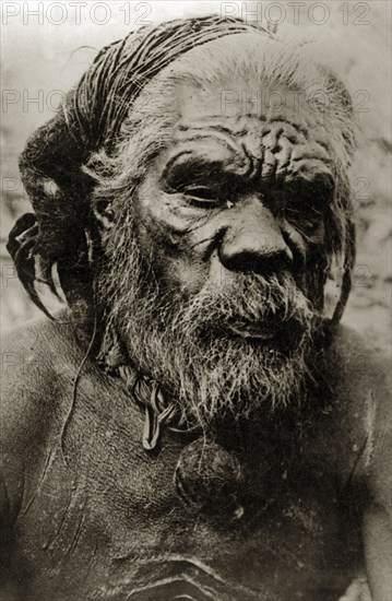The oldest man in the tribe. Portrait of an elderly aboriginal man from the Pinto tribe. Australia, 1925. Oceania.