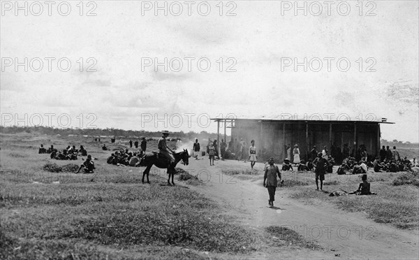 African market at Nairobi. People at an African market being held near a track in open grassland. Nairobi, British East Africa (Kenya), 1912. Nairobi, Nairobi Area, Kenya, Eastern Africa, Africa.