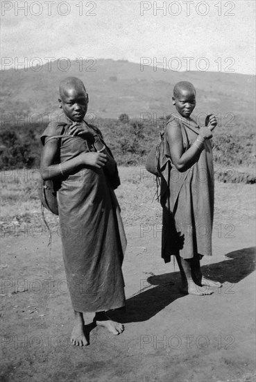 Two Kamba girls. Two young Kamba women pictured in a rural setting. Machakos, Kenya, June 1927. Machakos, East (Kenya), Kenya, Eastern Africa, Africa.