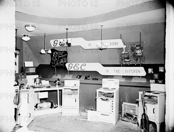 GEC 'in the kitchen'. Household appliances including ovens and washing machines exhibited at the General Electric Company's (GEC) stand at the Royal Show. Nairobi, Kenya, 28 September-1 October 1955. Nairobi, Nairobi Area, Kenya, Eastern Africa, Africa.