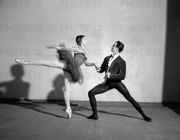 Daphne Dale and Nicholas Polajenko. Dancers Daphne Dale and Nicholas Polajenko in mid-performance, wearing traditional ballet costumes. Kenya, 28 October 1955. Kenya, Eastern Africa, Africa.