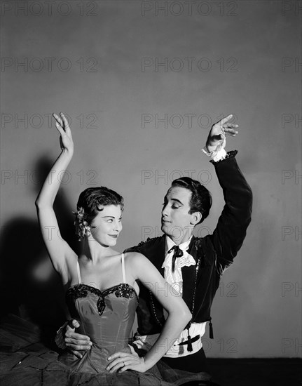 Daphne Dale and Nicholas Polajenko. Dancers Daphne Dale and Nicholas Polajenko, wearing theatrical costume and make up, strike a pose during a ballet routine. Kenya, 28 October 1955. Kenya, Eastern Africa, Africa.