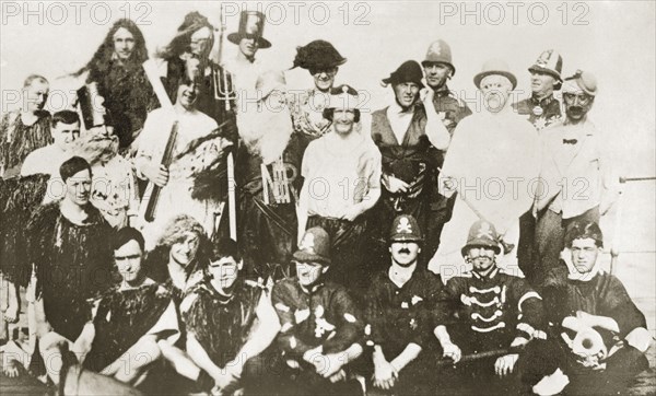 Crossing the line'. Crew members dressed in costume as King Neptune and his court for a 'crossing the line' naval initiation ceremony. Atlantic Ocean south of Sierra Leone, 14-22 December 1923., Western Africa, Africa.