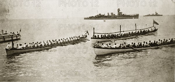 Samoan canoes. Large groups of rowers aboard long canoes off the coast of Western Samoa. Pacific Ocean near Western Samoa (Samoa), 28 May-4 June 1924. Samoa, Pacific Ocean, Oceania.