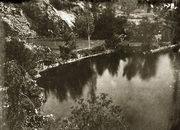 Lake at Butchart gardens. View of a lake and landscaped scenery at Butchart gardens. Victoria, Canada, 21 June-4 July 1924. Victoria, British Columbia, Canada, North America, North America .