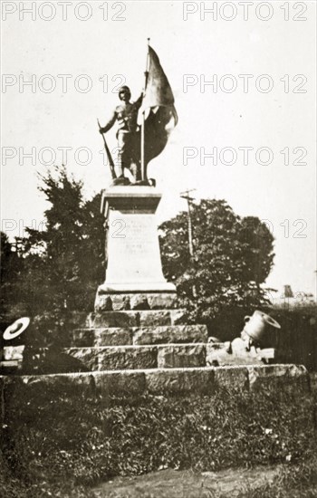 South African war memorial, Quebec. A South African war memorial, crowned with the statue of a soldier waving a flag. Quebec, Canada, 18 August-2 September 1924. Quebec, Quebec, Canada, North America, North America .