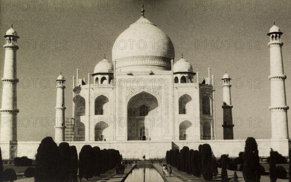 The Taj Mahal, circa 1954. View of the Taj Mahal, a mausoleum built for the wife of Emperor Shah Jahan (r.1628-58). The monument features a famous onion-shaped dome and several minarets typical of Mughal architecture, with a central canal leading up to it. Agra, Uttar Pradesh, India, circa 1954. Agra, Uttar Pradesh, India, Southern Asia, Asia.