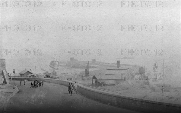 Accra harbour. View of Accra harbour taken from a wide road leading down a hillside. Accra, Gold Coast (Ghana), circa 1918. Accra, East (Ghana), Ghana, Western Africa, Africa.