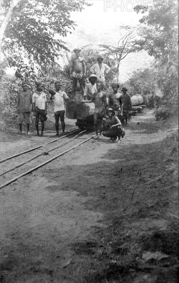Timber railway, Western Africa. A light man-powered railway designed for the transportation of logs. Possibly Ghana, circa 1920., Western Africa, Africa.