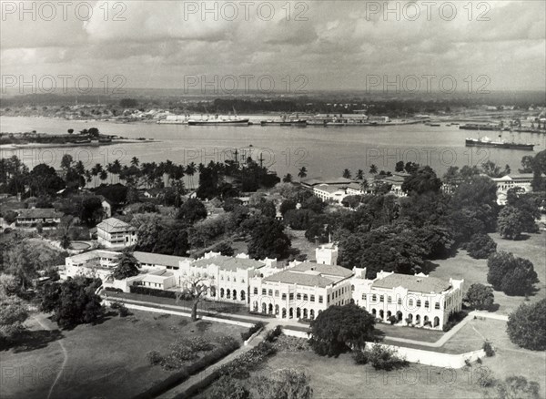 Colonial government building, Tanganyika. Official publicity shot for the Tanganyikan government, showing an aerial view of a grandiose colonial government building. Tanganyika Territory (Tanzania), circa 1960. Tanzania, Eastern Africa, Africa.