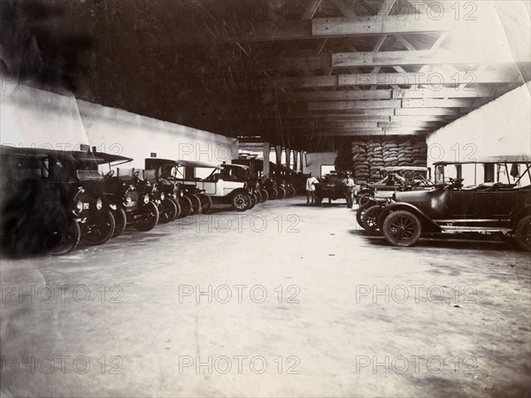 Swanzy garage, Gold Coast. Cars lined up in the Motor Transport Depot of F. & A. Swanzy Limited. Accra, Gold Coast (Ghana), April 1918. Accra, East (Ghana), Ghana, Western Africa, Africa.
