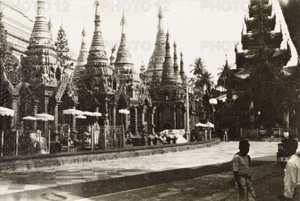 Planetary posts at the Shwe Dagon Pagoda. A number of ornate planetary posts stand at the base of the Shwe Dagon Pagoda. Each post represents the eight days of the week (Wednesday is separated into AM and PM) and features its own planet and animal symbol. Rangoon (Yangon), Burma (Myanmar), circa 1925. Yangon, Yangon, Burma (Myanmar), South East Asia, Asia.