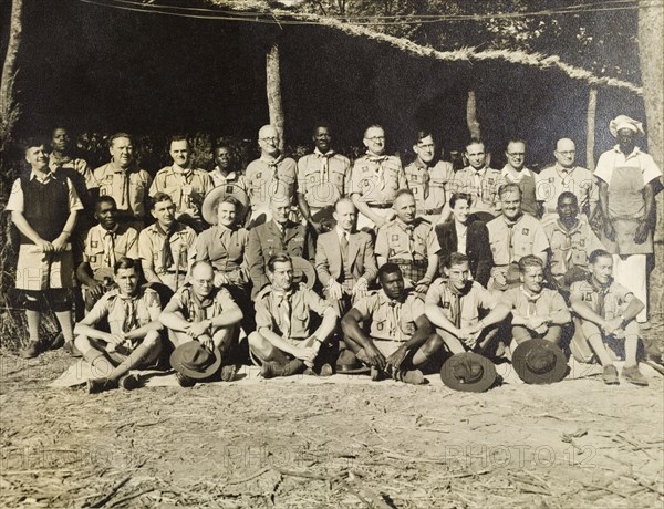 Scout leaders at a jamboree. Uniformed scout leaders from all over central Africa line up for the camera at an annual boy scout jamboree. General Sir John Stuart MacKenzie Shea is pictured amongst the group. Nkana-Kitwe, Northern Rhodesia (Zambia), June 1952. Nkana-Kitwe, Copperbelt, Zambia, Southern Africa, Africa.