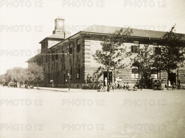 Post Office in Bulawayo. View of the Post Office in Bulawayo, a large stone building with a prominent clock tower. Bulawayo, Southern Rhodesia (Zimbabwe), circa 1930. Bulawayo, Zimbabwe, Southern Africa, Africa.