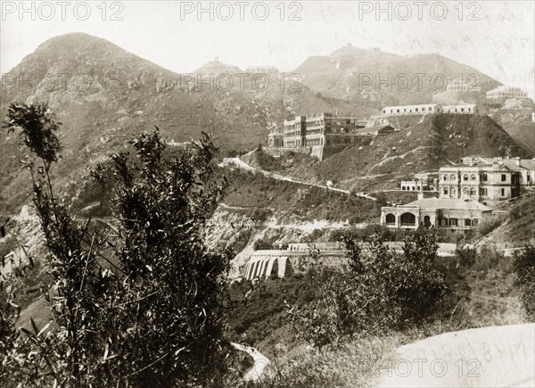 Victoria Peak, 1903. View of Victoria Peak, the highest mountain on Hong Kong Island, showing the Governor's summer residence, hotels and various grand buildings. Hong Kong, 1903. Hong Kong, Hong Kong, China, People's Republic of, Eastern Asia, Asia.