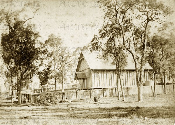 A temporary church at Indooroopilly. A makeshift wooden building with a pitched roof serves as a temporary church for the community of Indooroopilly. Indooroopilly, Australia, circa 1890. Indooroopilly, Queensland, Australia, Australia, Oceania.
