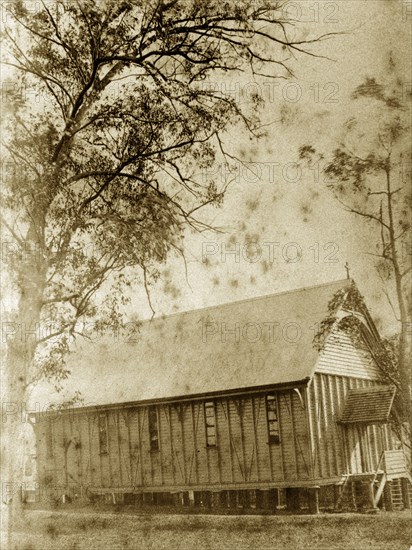 A temporary church in Indooroopilly. A makeshift wooden building with a pitched roof serves as a temporary church for the people of Indooroopilly. Indooroopilly, Australia, circa 1890. Indooroopilly, Queensland, Australia, Australia, Oceania.