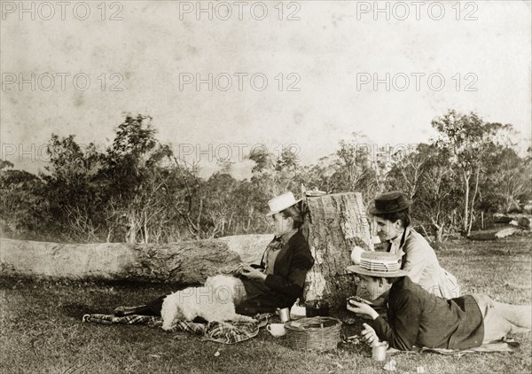 Enjoying a picnic, Australia. Outdoors portrait of members of the Brodribb family enjoying a picnic in the outback. Near Brisbane, Australia, circa 1908., Queensland, Australia, Australia, Oceania.