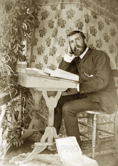 In contemplation with books, Australia. Amateur portrait of a man, possibly an Anglican vicar, in attitude of contemplation with books. Near Brisbane, Australia, circa 1895., Queensland, Australia, Australia, Oceania.