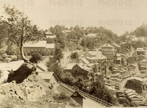 View over Murree, Pakistan. Hilltop view over Murree, showing the awnings and crowds of a busy market stretching into the distance along a winding road. Murree, Punjab, India (Punjab, Pakistan), 1898. Murree, Punjab, Pakistan, Southern Asia, Asia.