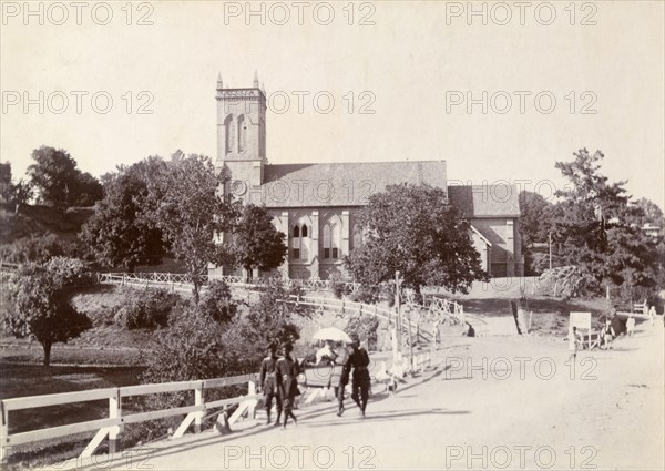The Anglican church at Murree. The traditionally English architecture of the Anglican church at Murree. Pakistani servants can be seen carrying a British passenger along the road in an open sedan chair. Murree, Punjab, India (Punjab, Pakistan), circa 1895. Murree, Punjab, Pakistan, Southern Asia, Asia.