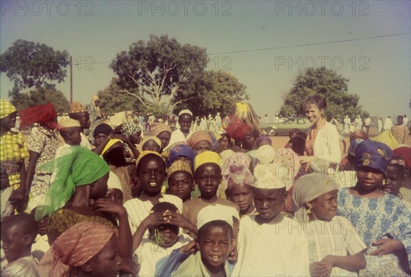 Celebrating the end of Ramadan. Nigerian children in traditional dress peer curiously into the camera at a celebration marking the end of Ramadan. Zaria, Nigeria, 1958. Zaria, Kaduna, Nigeria, Western Africa, Africa.