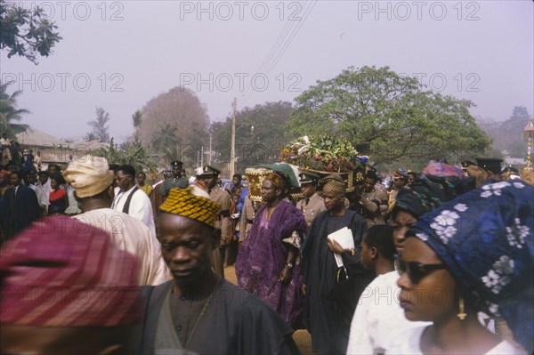 Fajuyi's state funeral. The decorated coffin of Lieutenant Colonel Francis Adekunle Fajuyi is carried through crowds by uniformed military men at his state funeral. Ado Ekiti, Nigeria, 1966. Ado Ekiti, Ekiti, Nigeria, Western Africa, Africa.