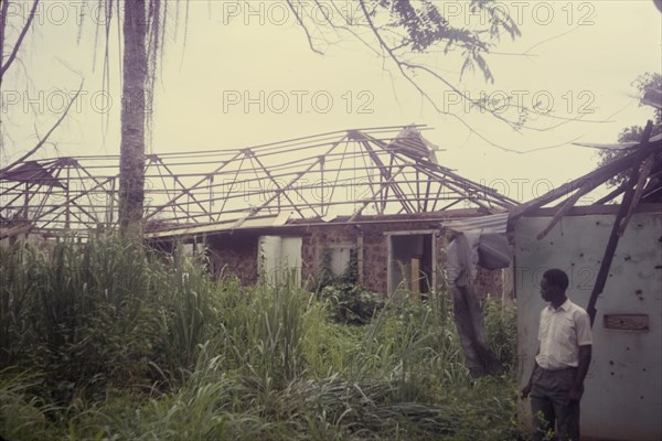 The remains of Dr Edmond's house. The skeleton of a building identified as 'Dr Edmond's house', one of several buildings in the Iyi Enu Church of Nigeria Hospital complex that fell victim to raids carried out during the Nigerian Civil War (1967-70). Iyi Enu, Nigeria, May 1970. Iyi Enu, Anambra, Nigeria, Western Africa, Africa.