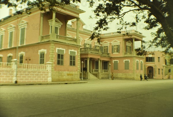 Government House, Macau. The pink walls and shuttered windows of the former Government House in Macau. Macau, People's Republic of China, January 1961. Macau, Macau, China, People's Republic of, Eastern Asia, Asia.