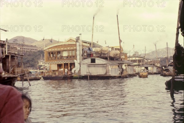 Floating restaurant at Aberdeen, Hong Kong. The famous Jumbo floating restaurant, located aboard a ferry moored in the harbour at Aberdeen Bay. Aberdeen, Hong Kong, People's Republic of China, January 1961. Aberdeen, Hong Kong, China, People's Republic of, Eastern Asia, Asia.