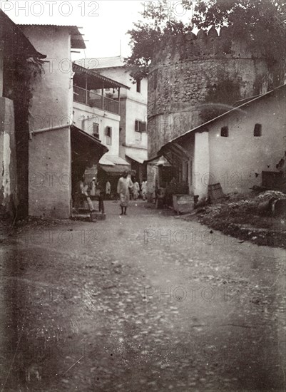 Zanzibar street. A small street in Zanzibar winds up a hill in the city centre. Zanzibar (Tanzania), 1906. Zanzibar Town, Zanzibar Urban/West, Tanzania, Eastern Africa, Africa.