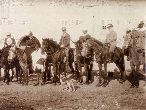 European hawking party. European men and women pose on their horses prior to setting out on a hawking trip. Safi, Morocco, 1898. Safi, Safi, Morocco, Northern Africa, Africa.