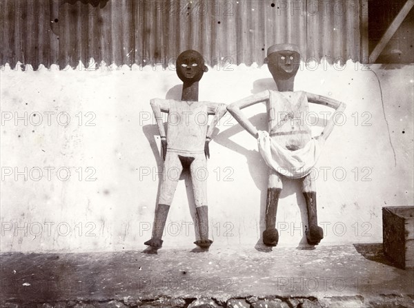 Anti-German spirit figurines. The two wooden figurines, both with hands on hips and one with a skirt-like dress hitched up to the waist, were apparently sent as hostile spirits to German settlers in East Africa during the Maji Maji uprising of 1905-7. Probably Tanzania, 1906., Eastern Africa, Africa.