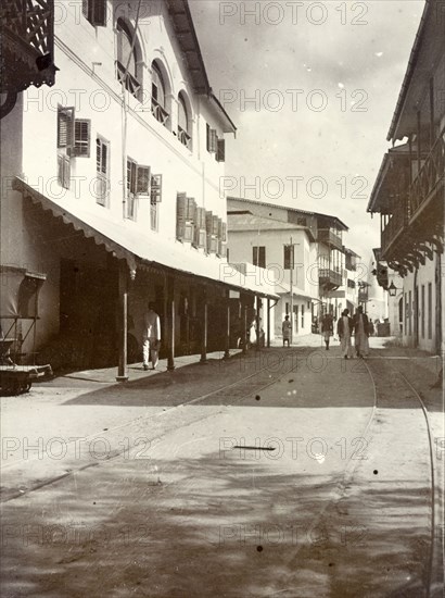 Vasca Da Gama Street, Mombasa. View down Vasca da Gama Street in the centre of Mombasa. The buildings edging the street look colonial in style, their awnings and balconies overshadowing the pavement. Mombasa, British East Africa (Kenya), 1906. Mombasa, Coast, Kenya, Eastern Africa, Africa.