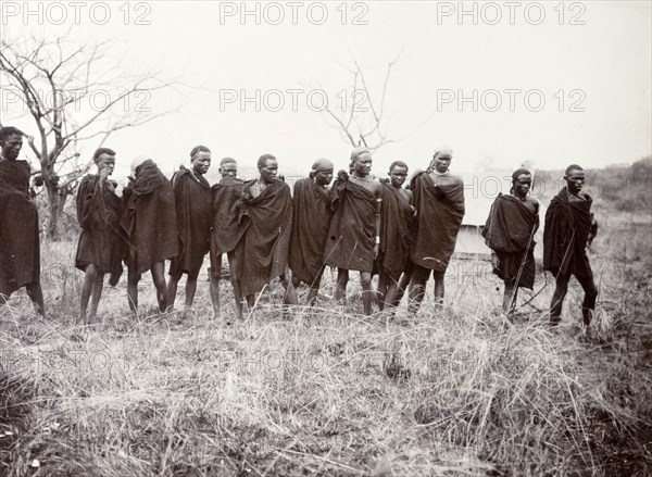 Porters on hunting safari. Kenyan porters assist Frederick Stanbury and a Protectorate colonial officer, Geoffrey Archer, on a hunting safari to Lake Baringo. British East Africa (Kenya), 1906. Kenya, Eastern Africa, Africa.