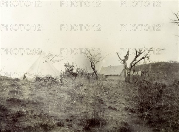 Stanbury's camp at Kikuyu. Safari tents erected at Kikuyu. This temporary camp site was one of several used by Frederick Stanbury and his travelling companion Geoffrey Archer in the Lake Baringo area. Kikuyu, British East Africa (Kenya), 1906. Kikuyu, Central (Kenya), Kenya, Eastern Africa, Africa.
