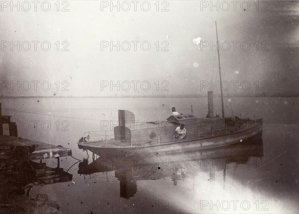 Boat launch on Lake Victoria. A fishing boat prepares to launch on the banks of Lake Victoria. Lake Victoria, British East Africa (Kenya), 1906., Nyanza, Kenya, Eastern Africa, Africa.