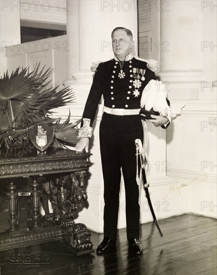 Portrait of Sir Franklin Gimson. Formal portrait of Sir Franklin Gimson, Governor of Singapore, at Government House. Singapore, Singapore, circa 1950. Singapore, Central (Singapore), Singapore, South East Asia, Asia.