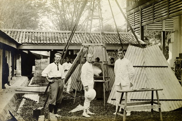 Trigonometrical Survey Office, Taipang. British surveyors pose in front of an iron beacon at the Trigonometrical Survey Office. Taiping, British Malaya (Malaysia), circa 1900. Taipang, Perak, Malaysia, South East Asia, Asia.